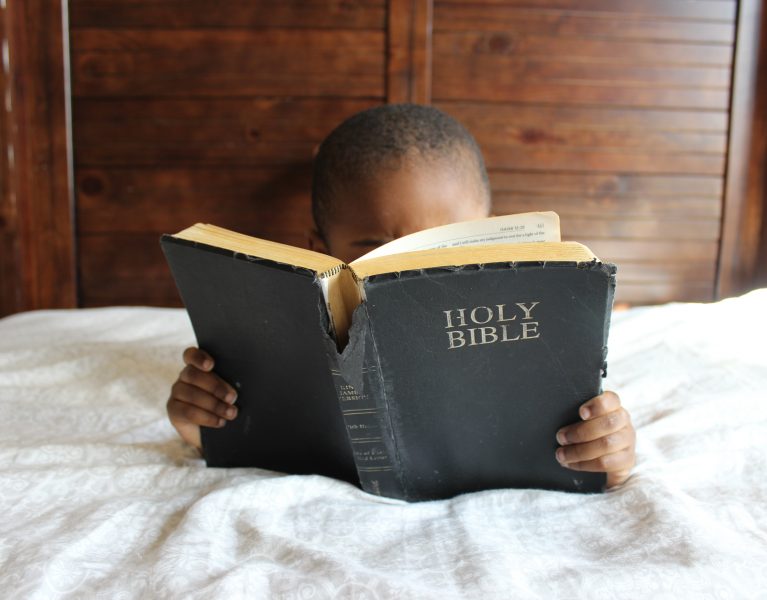 Little Boy Reading the Bible